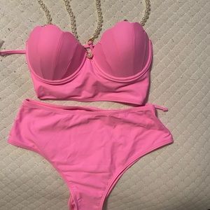2 piece swimsuit with pearl strap. Can fit up to a C cup
